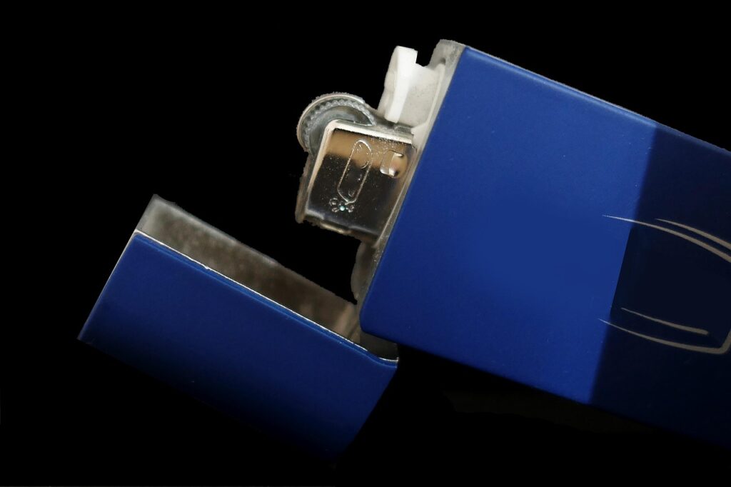 lighter, petrol lighter, light, metal, dark, closeup